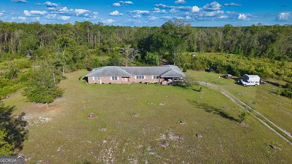 36 Acres of Agricultural Land with Home for Sale in Claxton, Georgia