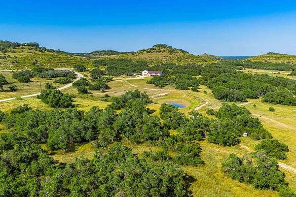 26.4 Acres of Recreational Land with Home for Sale in Blanco, Texas