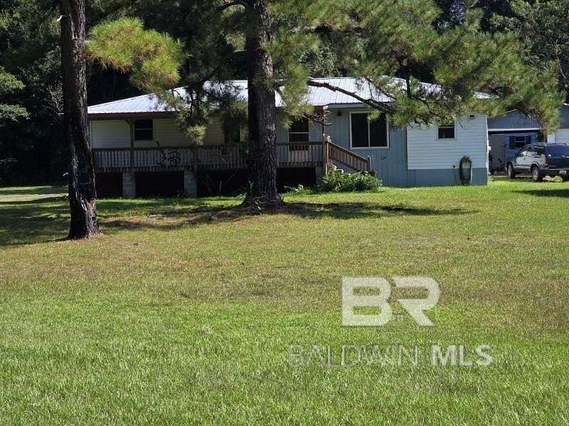 5.12 Acres of Residential Land with Home for Sale in Castleberry, Alabama