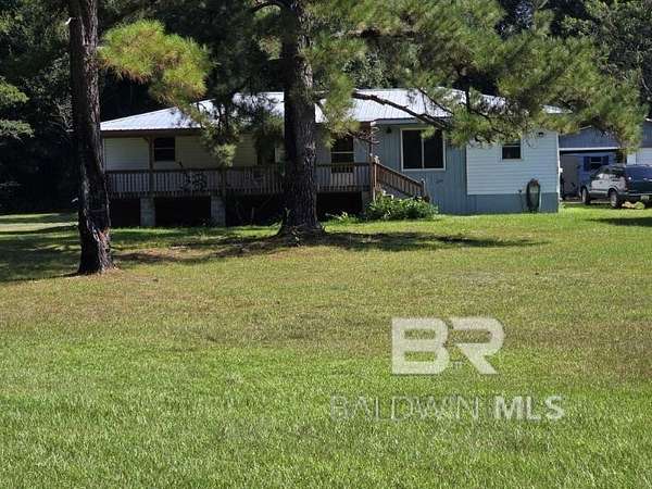 5.12 Acres of Residential Land with Home for Sale in Castleberry, Alabama