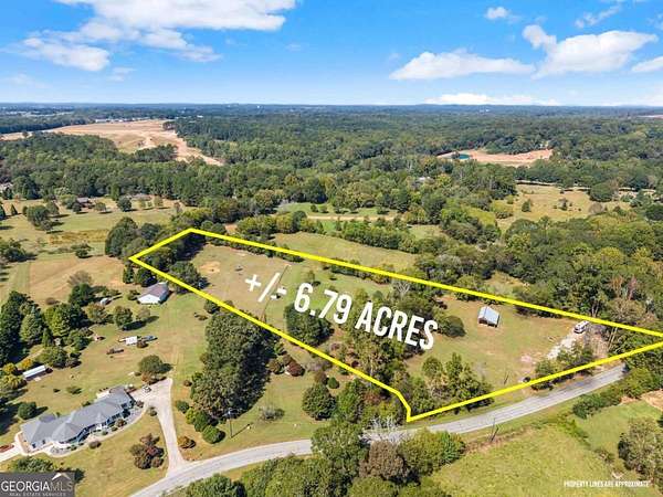 6.79 Acres of Land for Sale in Hoschton, Georgia