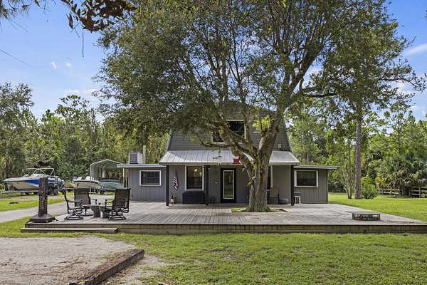 4.73 Acres of Residential Land with Home for Sale in Palm City, Florida