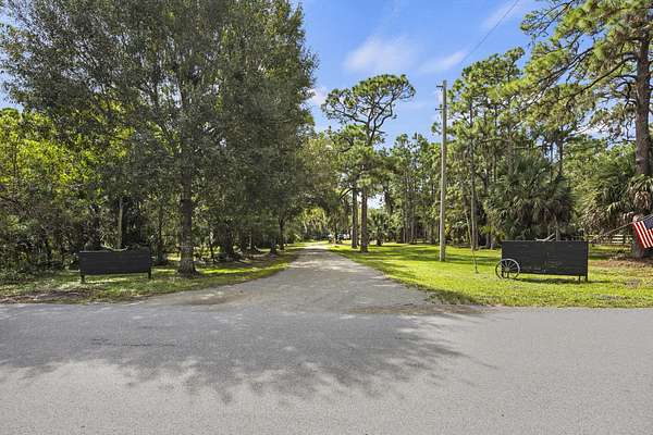 4.7 Acres of Land with Home for Sale in Palm City, Florida