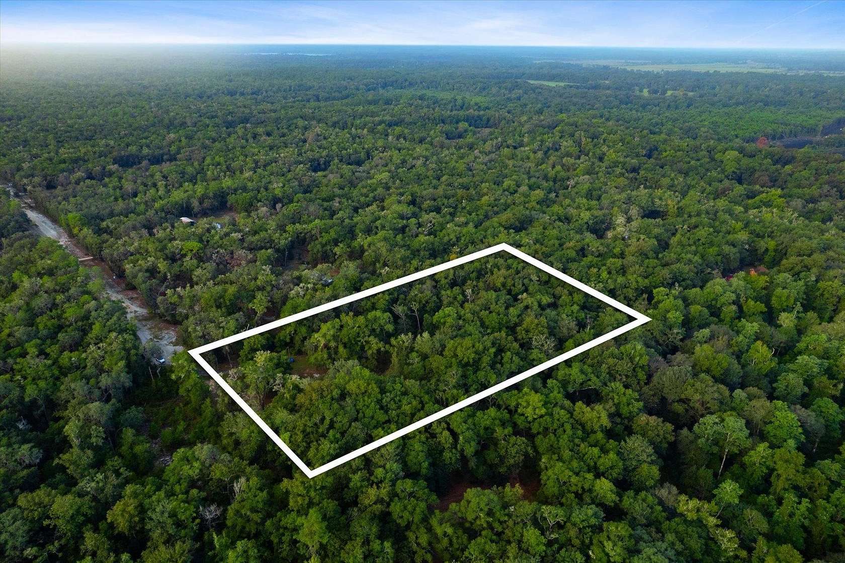 4.7 Acres of Residential Land for Sale in Florahome, Florida