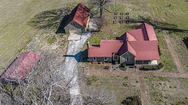 11.5 Acres of Land with Home for Sale in Millington, Tennessee