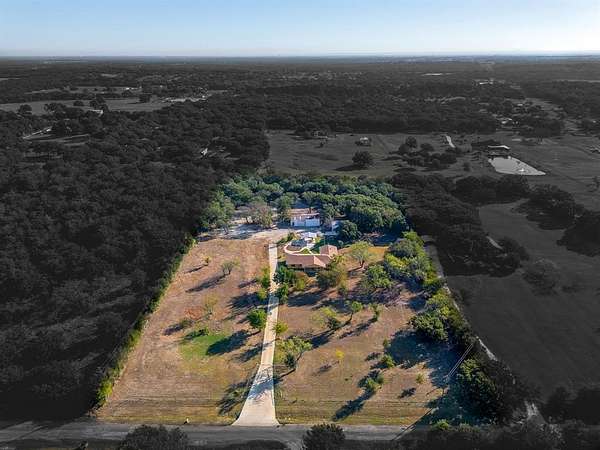 4.4 Acres of Residential Land with Home for Sale in Burleson, Texas