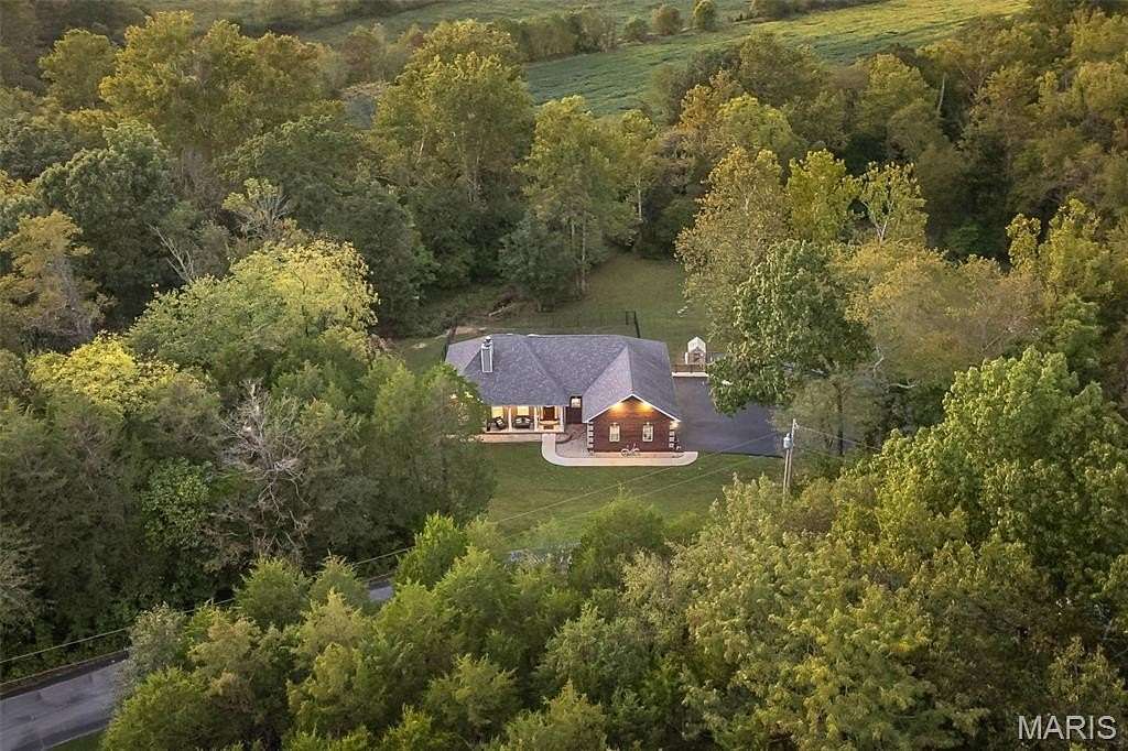 6.52 Acres of Residential Land with Home for Sale in Hillsboro, Missouri