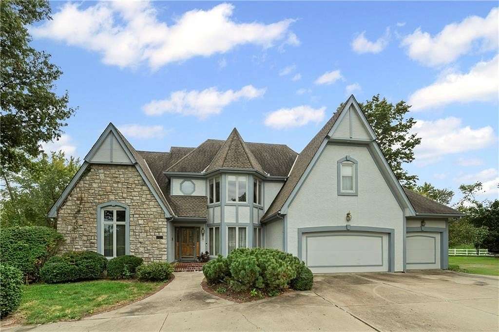 5 Acres of Residential Land with Home for Sale in Raymore, Missouri