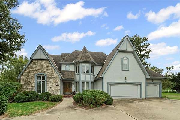 5 Acres of Residential Land with Home for Sale in Raymore, Missouri