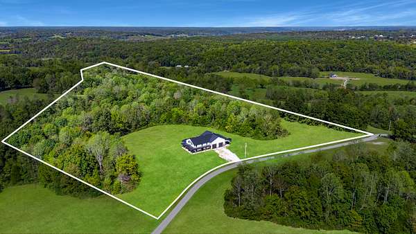 13.8 Acres of Land with Home for Sale in Nunnelly, Tennessee