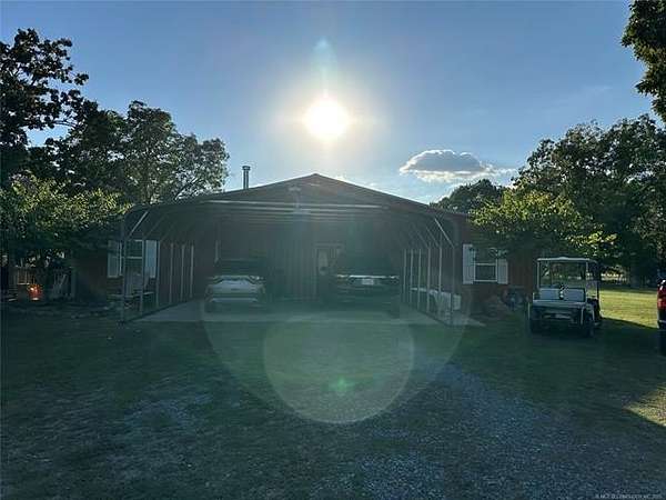 10 Acres of Residential Land with Home for Sale in Tahlequah, Oklahoma