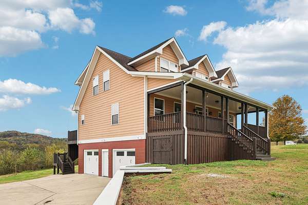 5.27 Acres of Residential Land with Home for Sale in Gordonsville, Tennessee