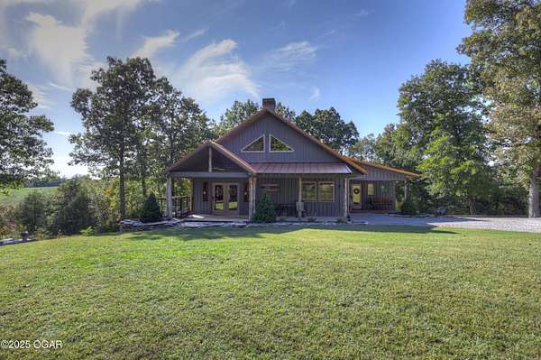 37 Acres of Land with Home for Sale in Pineville, Missouri