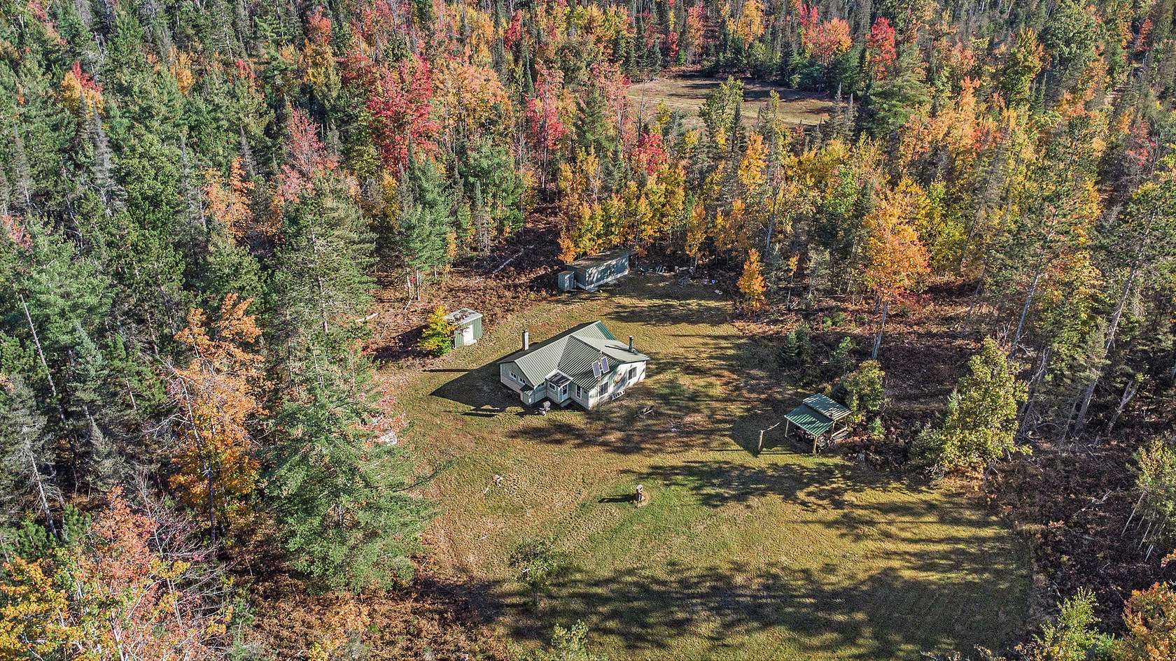 160 Acres of Recreational Land with Home for Sale in Atlanta, Michigan