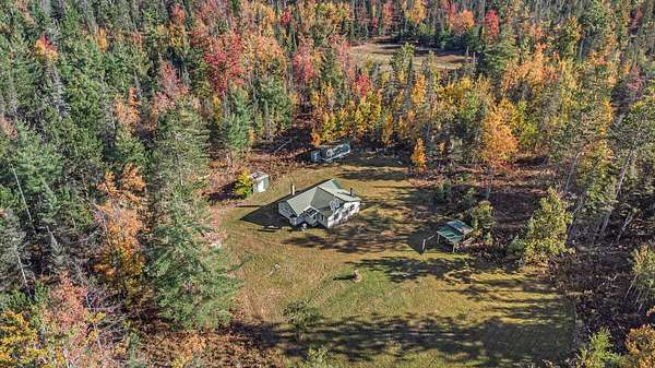 160 Acres of Recreational Land with Home for Sale in Atlanta, Michigan