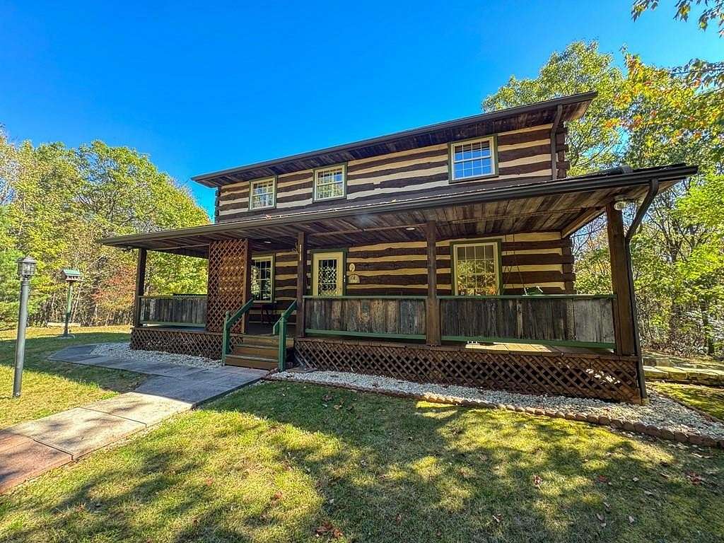 7.1 Acres of Residential Land with Home for Sale in James Creek, Pennsylvania