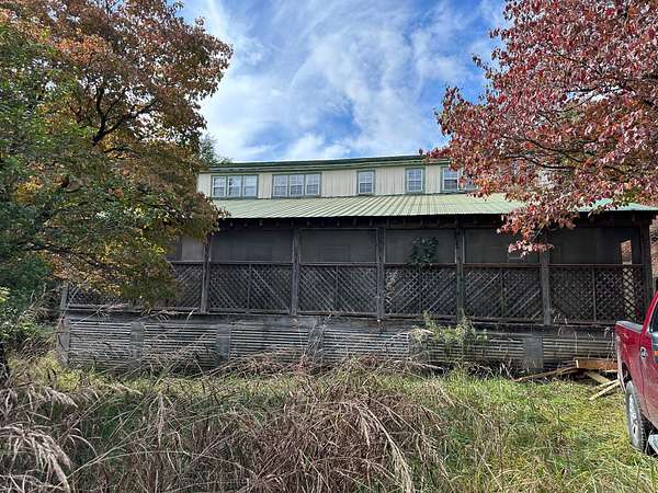 5.7 Acres of Residential Land with Home for Sale in Spring City, Tennessee