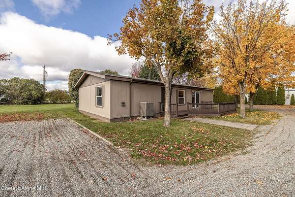 4.84 Acres of Residential Land with Home for Sale in Post Falls, Idaho