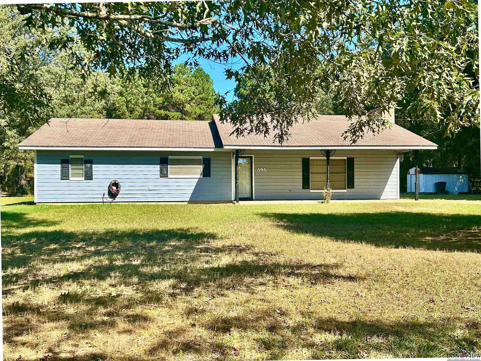 1.5 Acres of Residential Land with Home for Sale in Kilgore, Texas