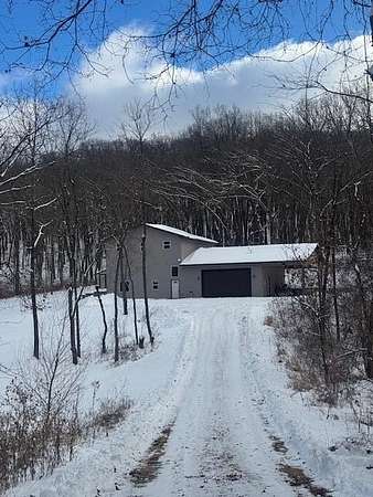 15.3 Acres of Recreational Land with Home for Sale in Wilton, Wisconsin