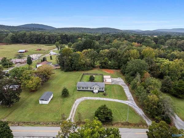 4 Acres of Residential Land with Home for Sale in Owens Cross Roads, Alabama