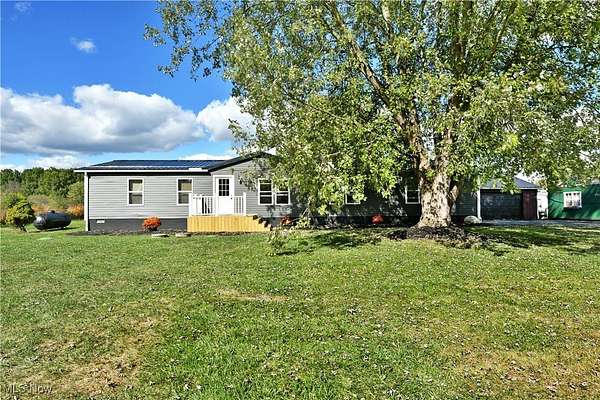 5.7 Acres of Residential Land with Home for Sale in Southington, Ohio