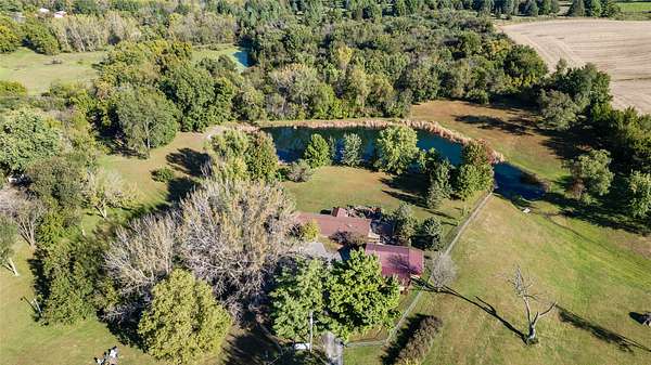 4 Acres of Residential Land with Home for Sale in Runnells, Iowa