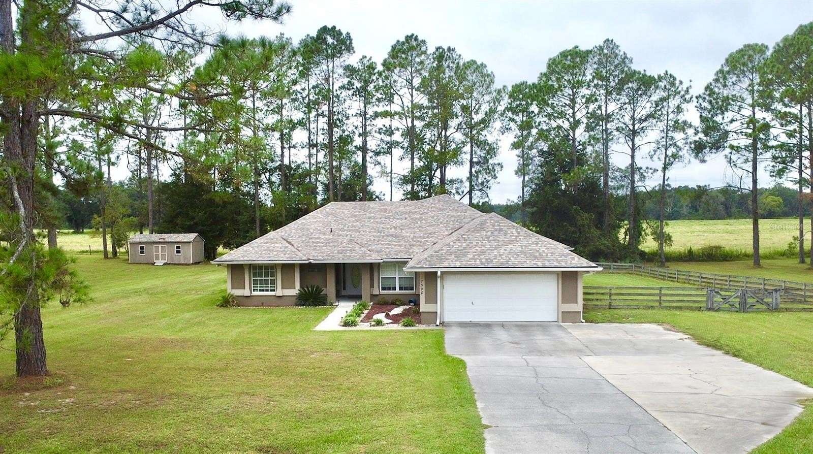 1.54 Acres of Residential Land with Home for Sale in Alachua, Florida