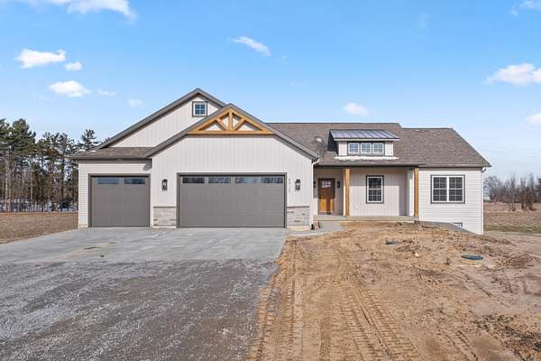 2 Acres of Land with Home for Sale in Coopersville, Michigan