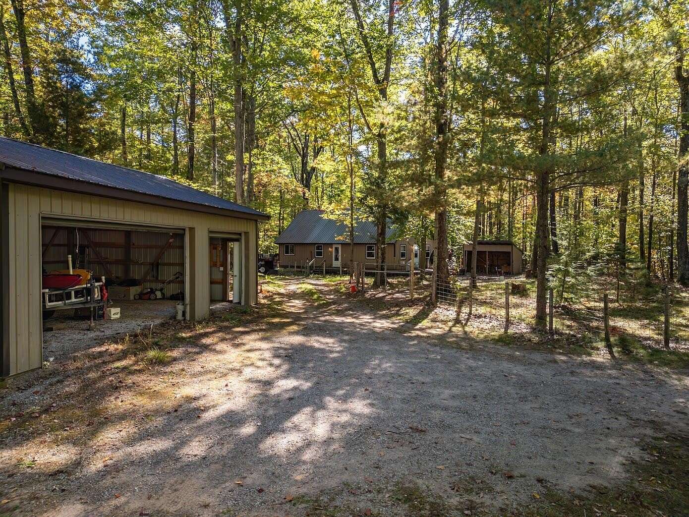 3 Acres of Residential Land with Home for Sale in Indian River, Michigan