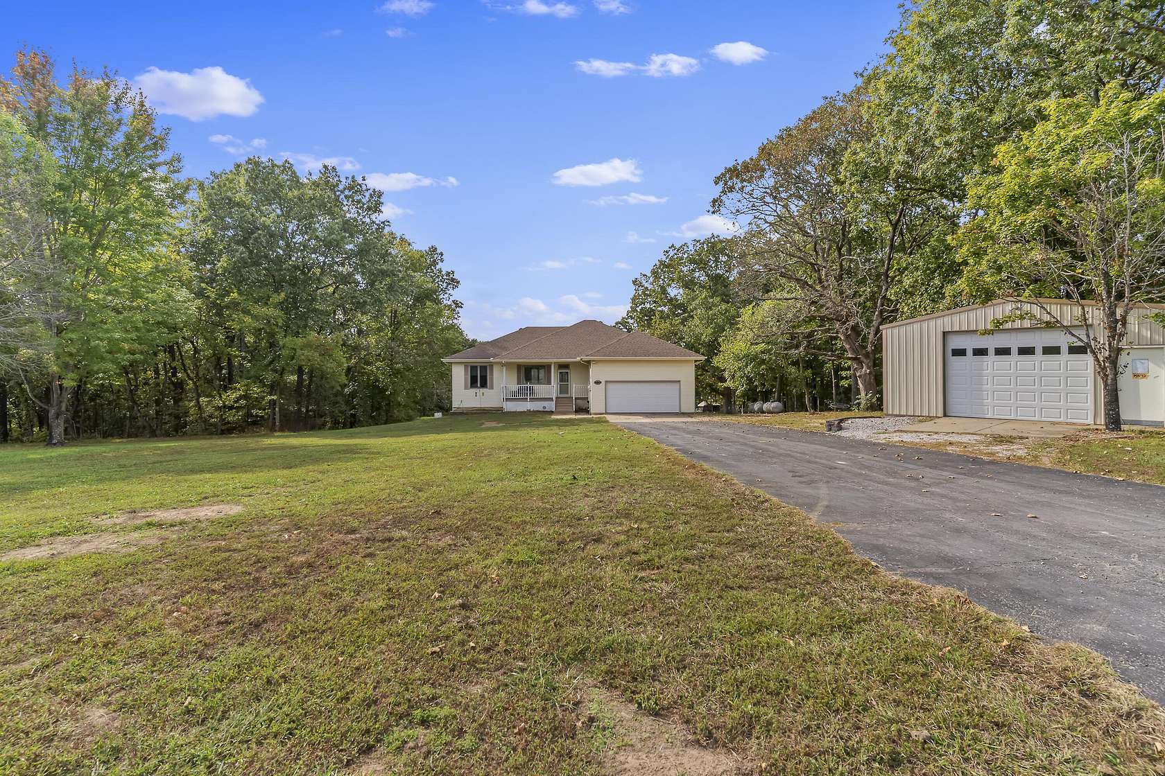 6.69 Acres of Residential Land with Home for Sale in Clever, Missouri