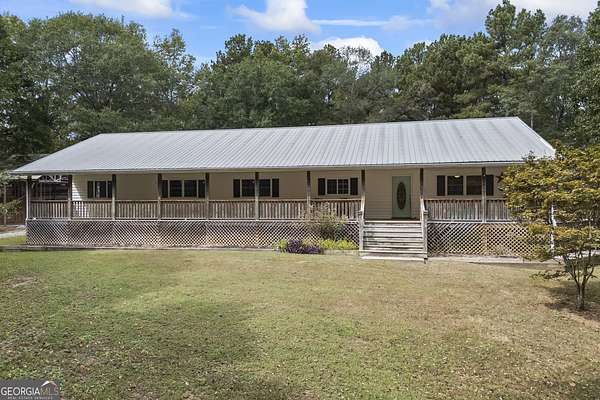 6.63 Acres of Residential Land with Home for Sale in Braselton, Georgia