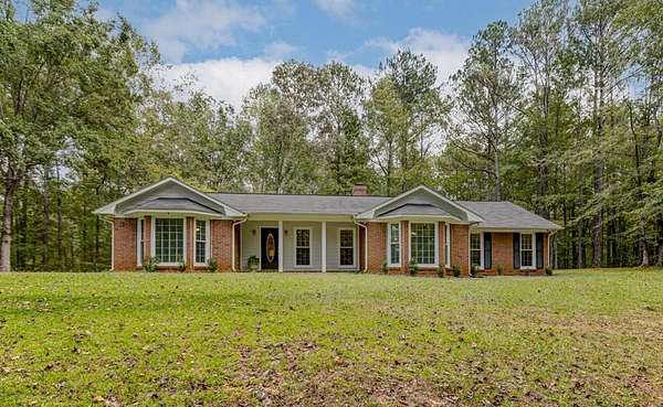 5 Acres of Residential Land with Home for Sale in Fortson, Georgia