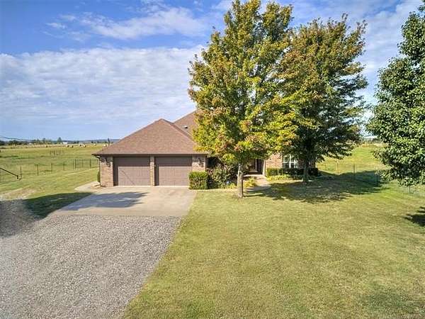 12.1 Acres of Land with Home for Sale in Dewey, Oklahoma