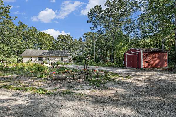 4.32 Acres of Residential Land with Home for Sale in Indian River, Michigan