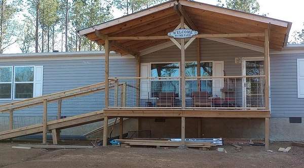 7.58 Acres of Residential Land with Home for Sale in Calhoun, Tennessee