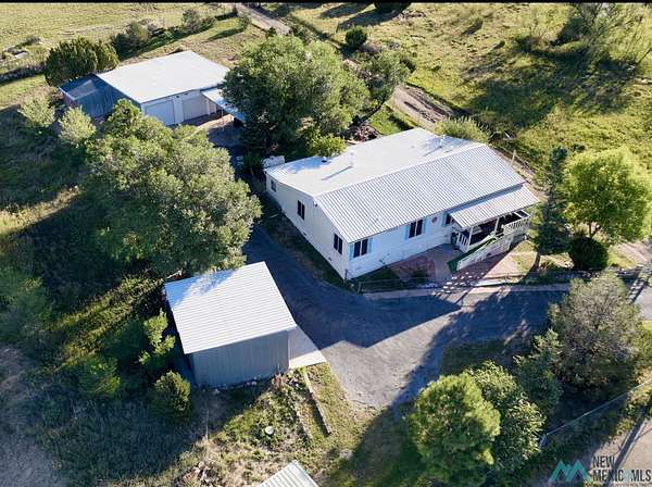 10 Acres of Residential Land with Home for Sale in Las Vegas, New Mexico