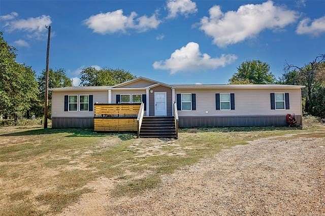 5.6 Acres of Residential Land with Home for Sale in Marietta, Oklahoma