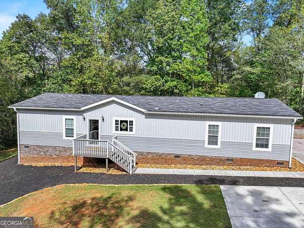 3.43 Acres of Residential Land with Home for Sale in Homer, Georgia