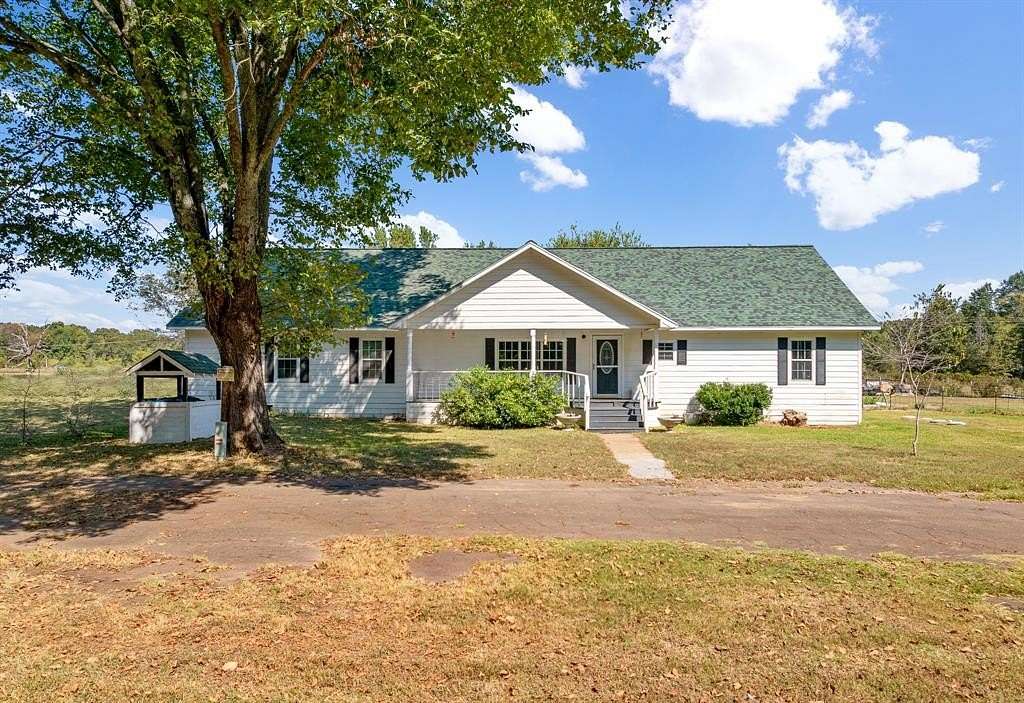 13 Acres of Land with Home for Sale in Mount Pleasant, Texas