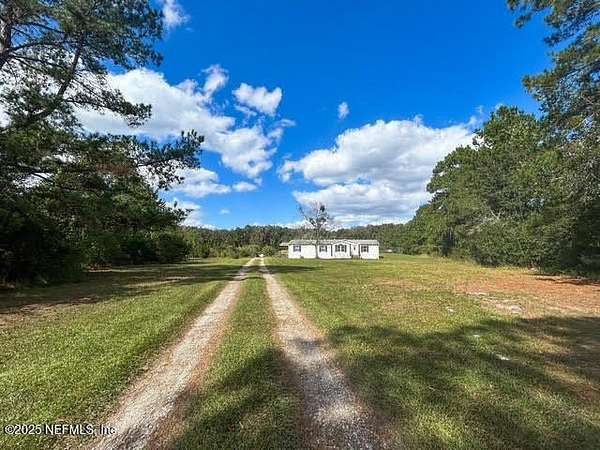 10.9 Acres of Land with Home for Sale in Keystone Heights, Florida