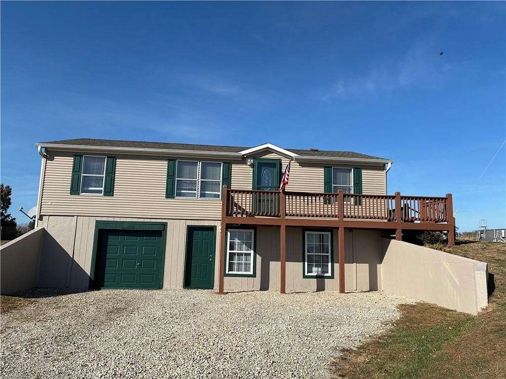 5 Acres of Residential Land with Home for Sale in Centerview, Missouri