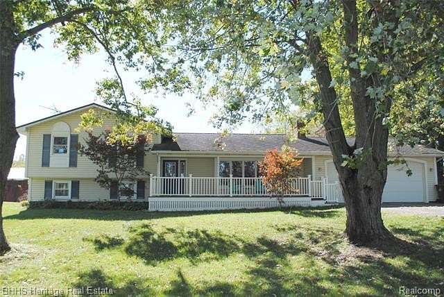 10.8 Acres of Recreational Land with Home for Sale in Webberville, Michigan