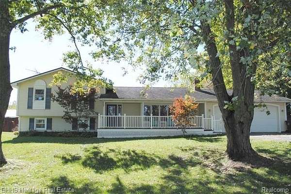 10.8 Acres of Recreational Land with Home for Sale in Webberville, Michigan