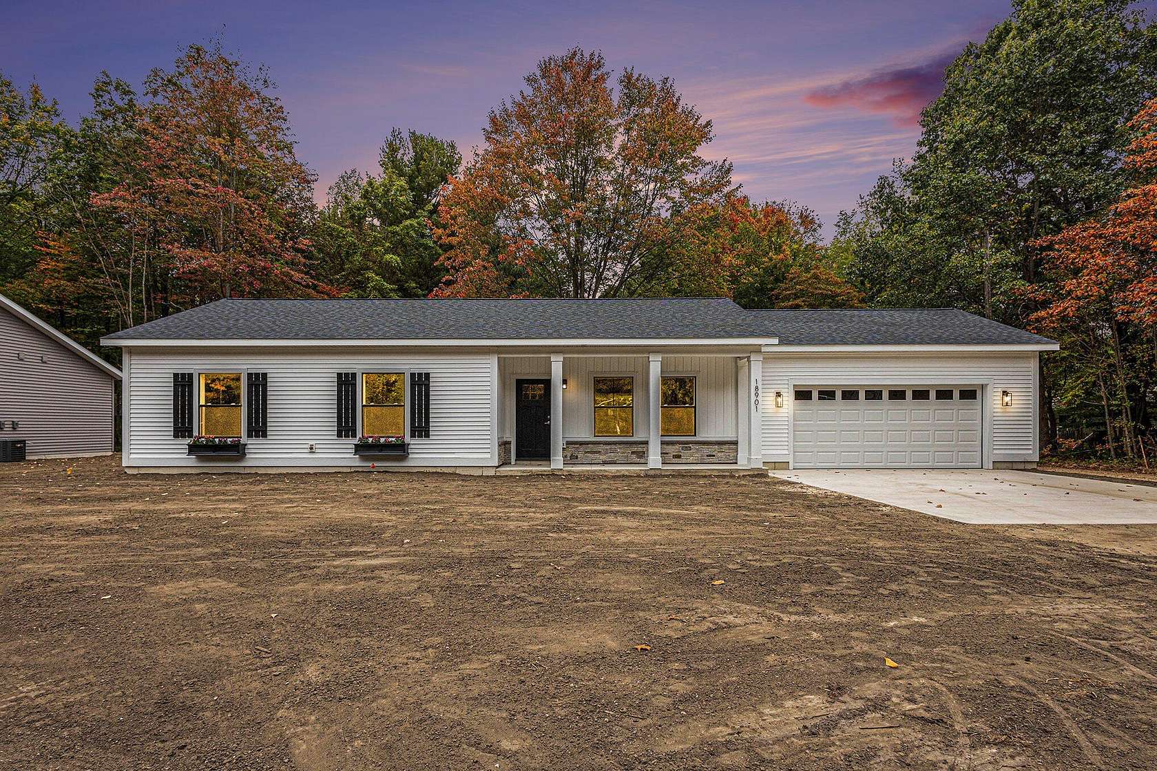 1.5 Acres of Residential Land with Home for Sale in Spring Lake, Michigan