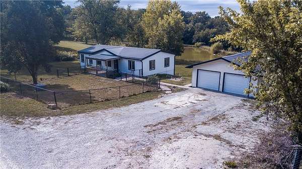 1.8 Acres of Residential Land with Home for Sale in Excelsior Springs, Missouri