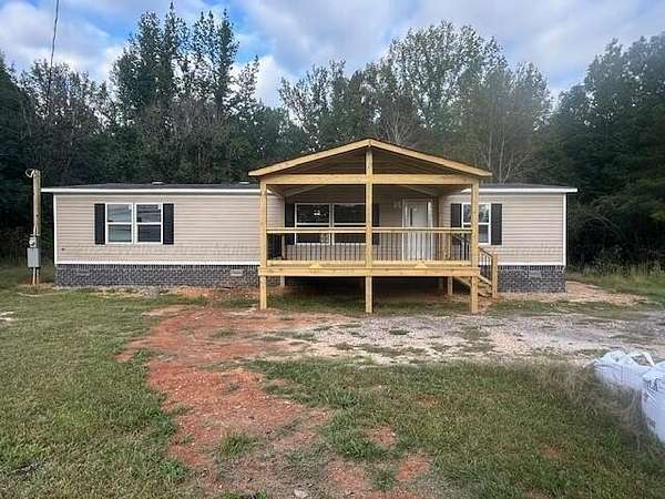 1.5 Acres of Residential Land with Home for Sale in Carbon Hill, Alabama