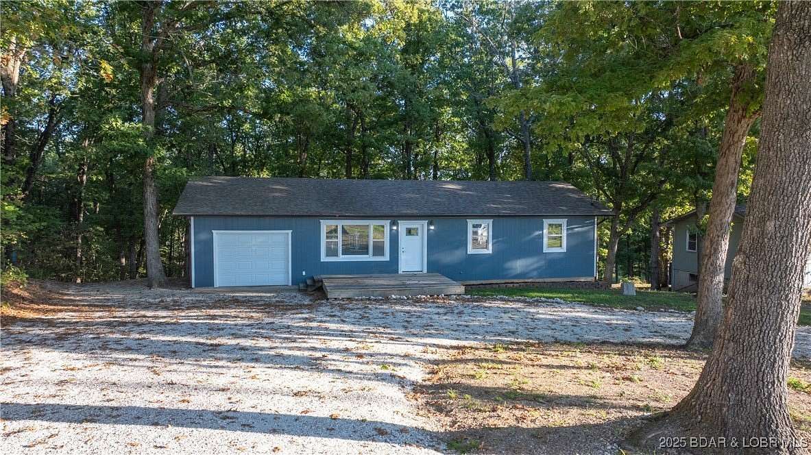 1.55 Acres of Residential Land with Home for Sale in Lake Ozark, Missouri