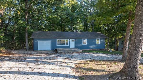 1.55 Acres of Residential Land with Home for Sale in Lake Ozark, Missouri