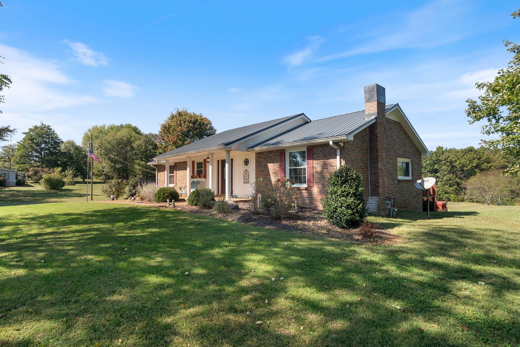 7 Acres of Residential Land with Home for Sale in Bon Aqua, Tennessee